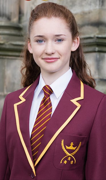Embroidered school crest on a Trutex blazer